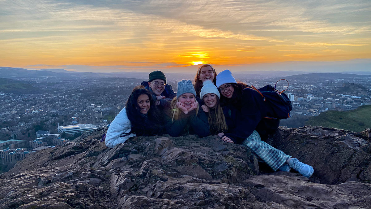 Study Abroad students in London with a sunset in the background