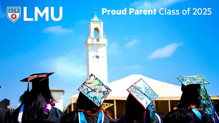 Graduates seated in Sunken Garden during the commencement ceremony with Sacred Heart Chapel in the distance and the words Proud Parent Class of 2025